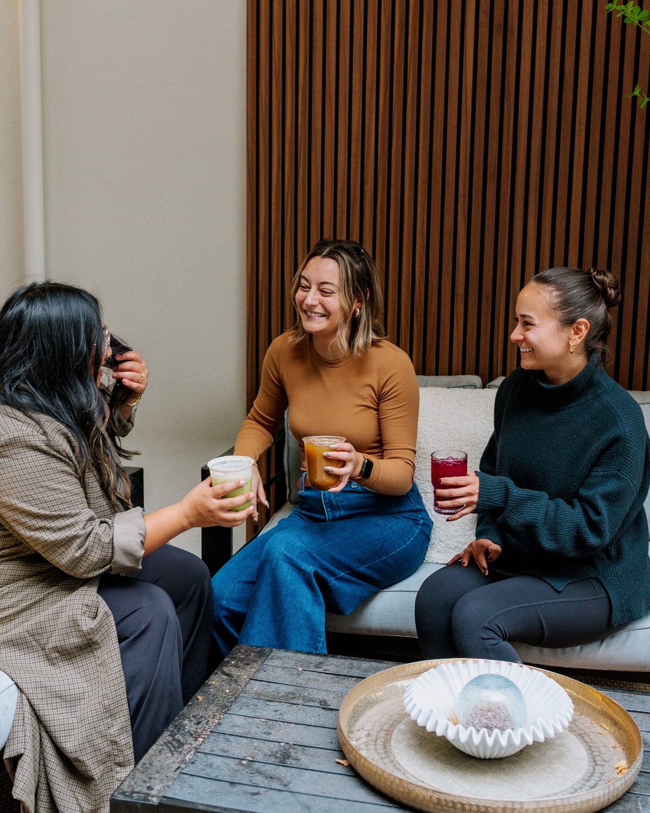 Friends gathered on patio at golden hour