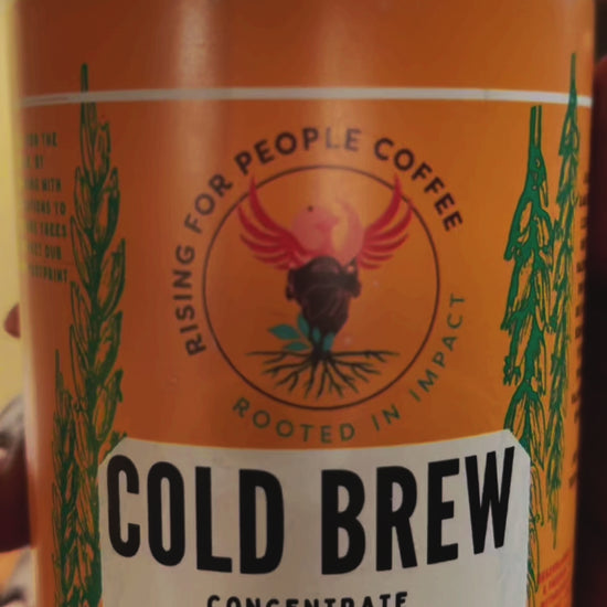Rising for People Coffee cold brew bottle—Organic original concentrated cold brew, made with specialty Ethiopia roasted coffee beans , Latte,
Cappuccino,
Coffee shop,
Coffee shop near,
Coffee near me,
Roasted coffee,
Speciality coffee,
Green coffee,
Black coffee,
Espresso machine,
French press,
Espresso,
Takeout coffee near